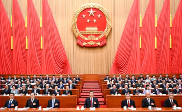 十四届全国人大三次会议开幕 习近平等在主席台就座